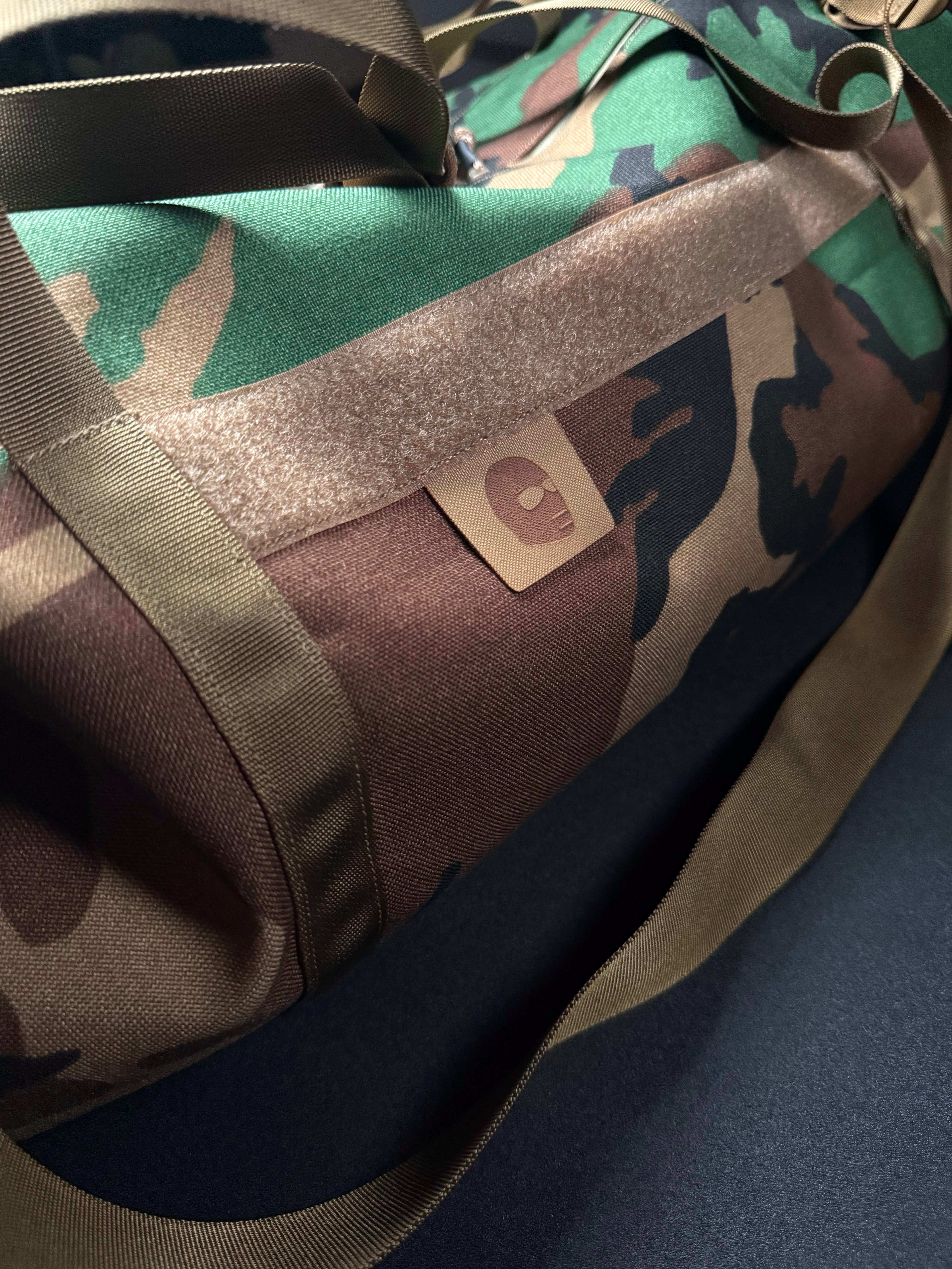 M81 (WOODLAND) DUFFLE W/ HUNTER ORANGE INTERIOR DEADLY CUSTOMS